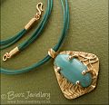 Bronze and Amazonite pendant on leather