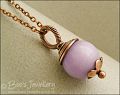 Lilac jade flower capped and wire wrapped pendant