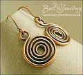 Antiqued copper round profile spiral earrings