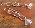 Sterling silver knot earrings with icy rock crystal chips