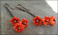 Copper chain earrings with orange glass flowers