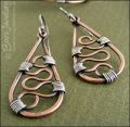Squiggle filled teardrop earrings in copper and silver