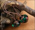 Antiqued copper and green glass long drop earrings