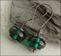 Oxidised copper with green glass long drop earrings
