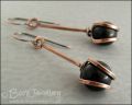 RESERVED - Antiqued copper loop capture earrings