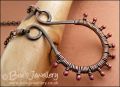 Antiqued copper scroll necklace wrapped with rosy buds
