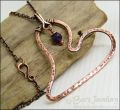 Copper heart pendant with faceted rainbow fluorite stone