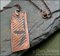 Abstract design etched copper pendant on chain
