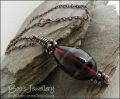 Aubergine and green glass pendant with molten buds