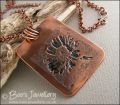 Antiqued copper etched daisy pendant