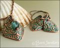 Necklace and earring set  with copper charms impressed with turquoise spirals
