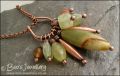 Jade bead cluster and horseshoe loop pendant on chain