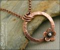 Hammered copper ring and flower necklace