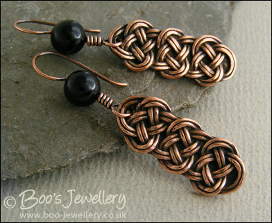 Antiqued copper and onyx knot earrings