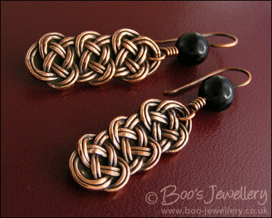 Antiqued copper and onyx knot earrings