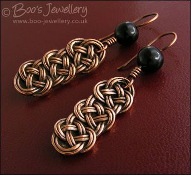 Antiqued copper and onyx knot earrings