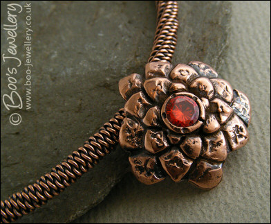 Copper flower and rope necklace with  large set CZ stone