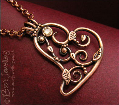 Filigree heart pendant with Champagne CZ stone