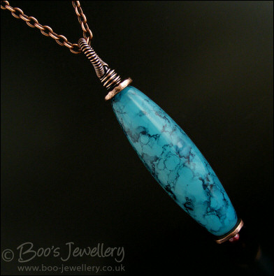 Turquoise marbled glass torpedo pendant
