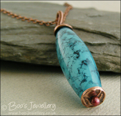 Turquoise marbled glass torpedo pendant