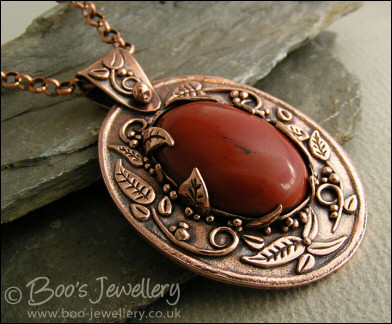 Red jasper cabochon and copper leaf pendant set