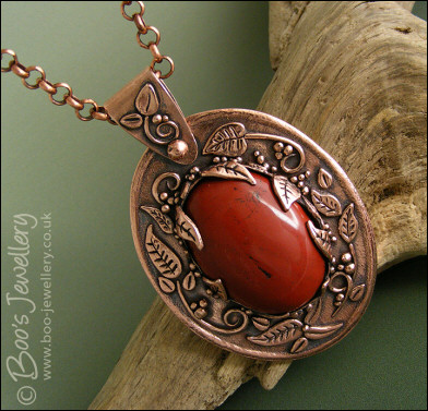 Red jasper cabochon and copper leaf pendant set