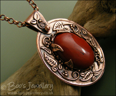 Red jasper cabochon and copper leaf pendant set