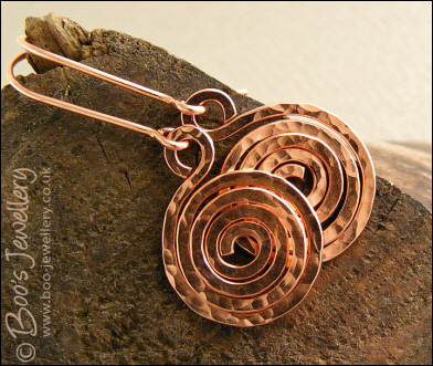 Hammered texture shiny copper spiral earrings