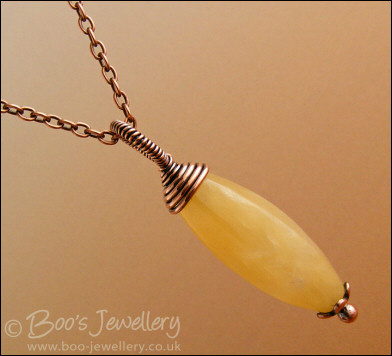 Honey quartz and antiqued copper wire wrapped pendant