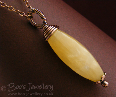 Honey quartz and antiqued copper wire wrapped pendant