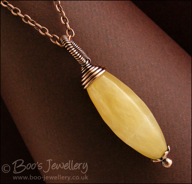Honey quartz and antiqued copper wire wrapped pendant