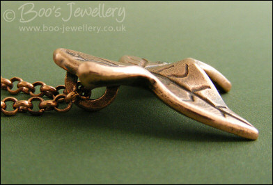 Copper ivy leaf pendant set with Cubic Zirconia raindrop