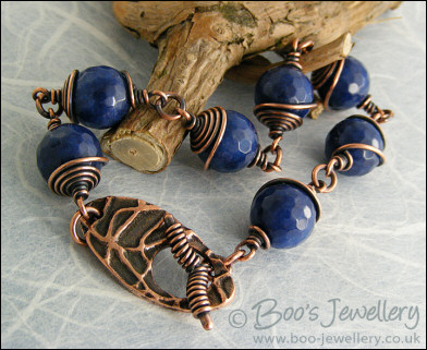 Deep blue faceted Jade bead and copper toggle bracelet