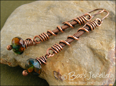 Coil on coil long drop earrings with glass dangles