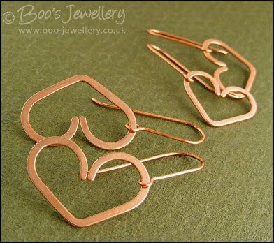 Hammered heart earrings in copper