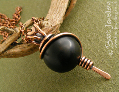 Large Obsidian bead pendant with spiral wrapped bail