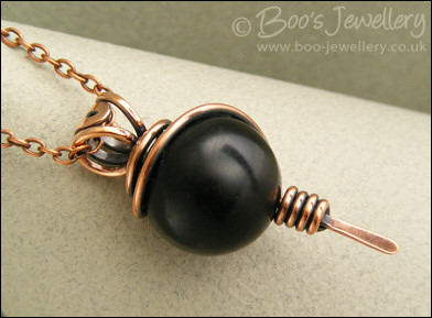 Large Obsidian bead pendant with spiral wrapped bail
