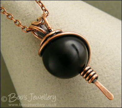 Large Obsidian bead pendant with spiral wrapped bail