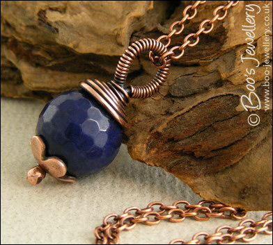 Deep blue faceted jade and copper pendant on chain