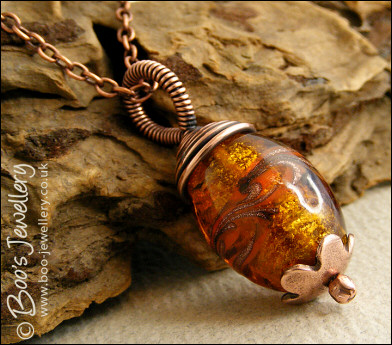 Amber fancy glass and copper wire wrapped pendant on chain - made to order