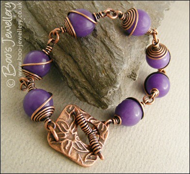 Antiqued copper spiral wrapped Lavender Jade toggle bracelet