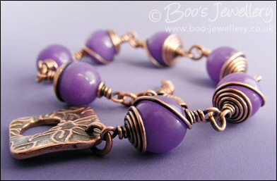 Antiqued copper spiral wrapped Lavender Jade toggle bracelet