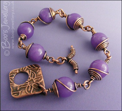 Antiqued copper spiral wrapped Lavender Jade toggle bracelet