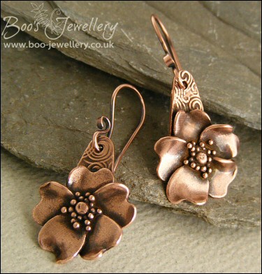 Wild rose hand sculpted copper earrings
