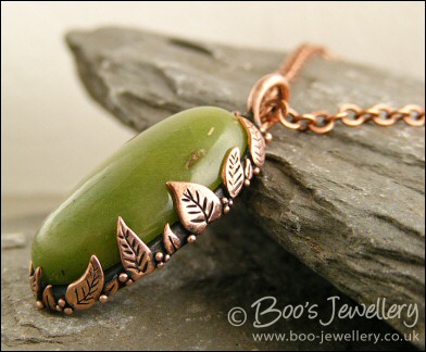 Faux green jade cabochon and leaf themed pendant
