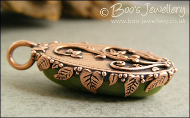 Faux green jade cabochon and leaf themed pendant