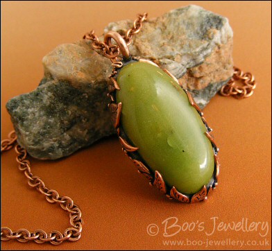 Faux green jade cabochon and leaf themed pendant