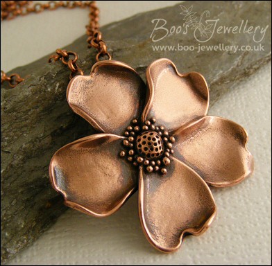 Solid copper hand sculpted wild rose pendant