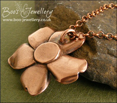 Solid copper hand sculpted wild rose pendant