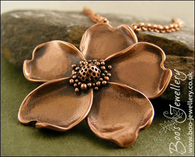 Solid copper hand sculpted wild rose pendant